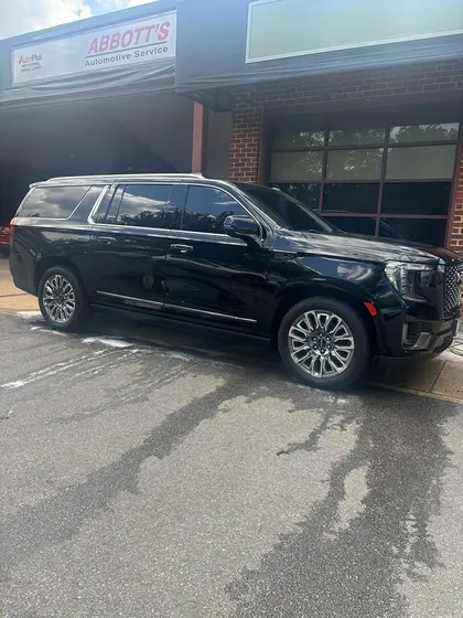 Black Cadillac Escalade tinted at the shop