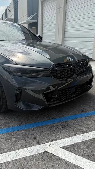 Dark BMW M340i with ceramic tint